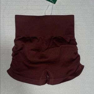 HALARA High-Waist Ruched Biker Shorts in Deep Brown